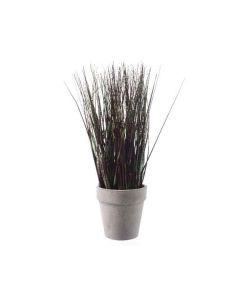 Herbe en plastique dans pot vert et rouge